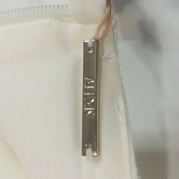 Stasia Alexis Design Sleeveless White Dress for Glamorous Occasions - Picture 10 of 17